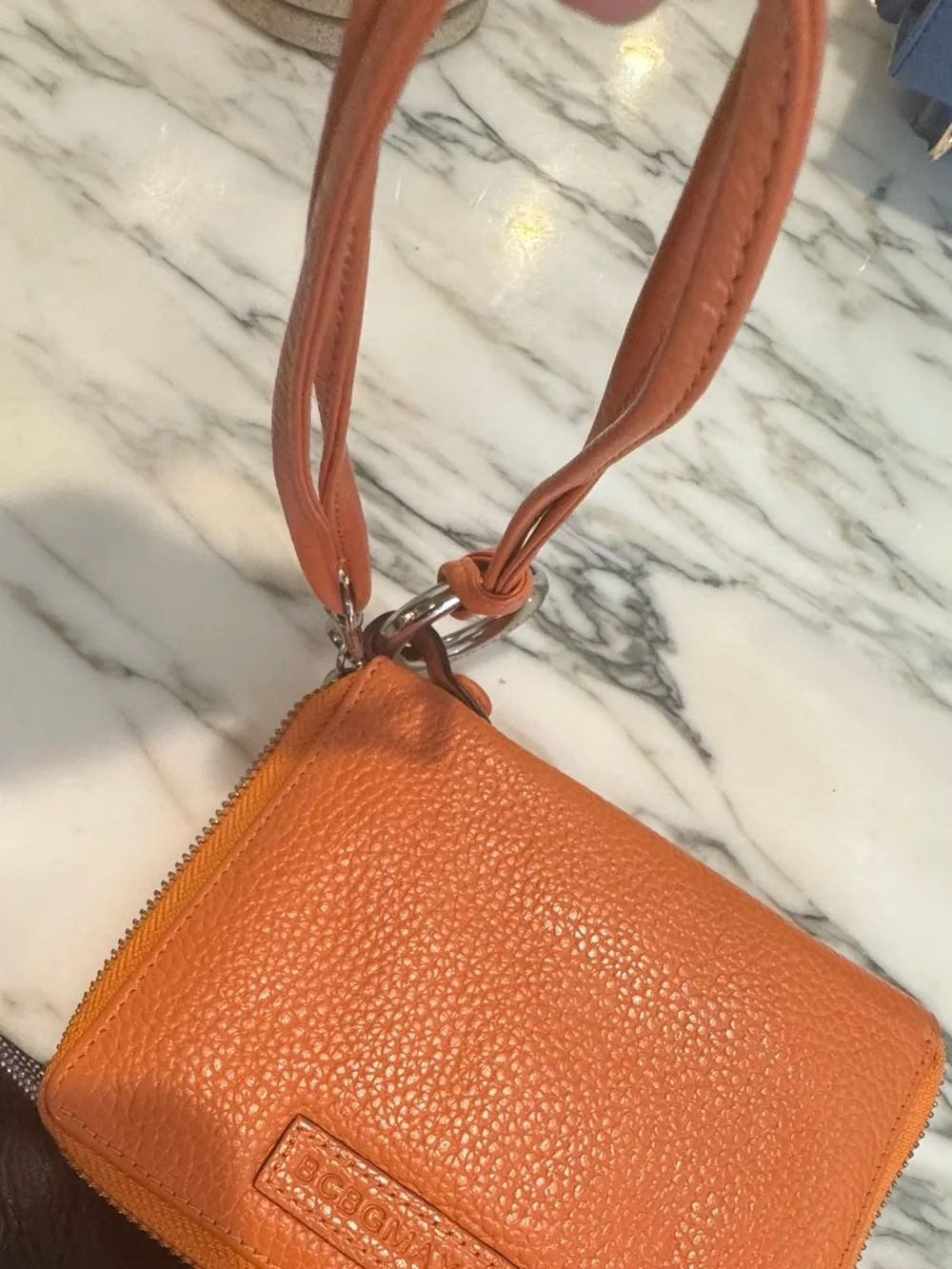 BCBGMaxAzria Orange Pebbled Leather Wristlet Clutch